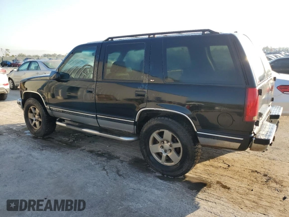 1997 GMC Yukon with VIN 1GKEK13R4VJ752757, listed as a Copart auction lot 75574214 with 251,193 mi miles and Clean Title. Bid and sale history available at carsss.com. Image 2.