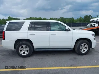 2015 Chevrolet Tahoe Commercial z VIN 1GNLC2EC1FR721538, wystawiony jako IAAI lot #42274601 z przebiegiem 138 991 mil mil oraz . Historia ofert i sprzedaży dostępna na DreamBid. Obrazek 13.