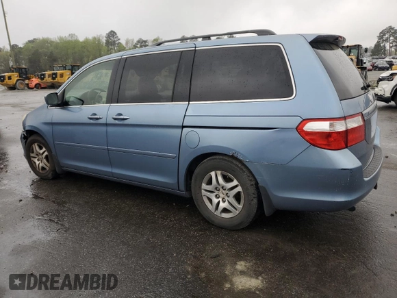 2005 Honda Odyssey EX-L with VIN 5FNRL38645B060123, listed as a Copart auction lot 51112735 with 227,247 mi miles and Salvage Title. Bid and sale history available at carsss.com. Image 2.