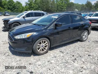 2018 Ford Focus SE with VIN 1FADP3F22JL265175, listed as a Copart auction lot 62916255 with 90,348 mi miles and Salvage title. Bid and sale history available at DreamBid. Image 1.