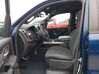 2019 Ram 1500 Big Horn/Lone Star with VIN 1C6SRFFT7KN663677, listed as a IAAI auction lot 40325088 with 77,035 mi miles. Bid and sale history available at carsss.com. Image 5.