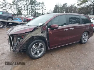 2019 Honda Odyssey Touring with VIN 5FNRL6H82KB060023, listed as a IAAI auction lot 41451199 with 82,994 mi miles. Bid and sale history available at carsss.com. Image 20.