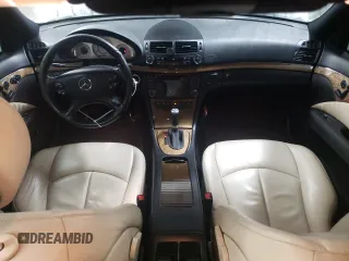2009 Mercedes-Benz E-Class Luxury 3.5L with VIN WDBUF56X39B421390, listed as a Copart auction lot 47384395 with 125,642 mi miles and Salvage Title. Bid and sale history available at carsss.com. Image 8.
