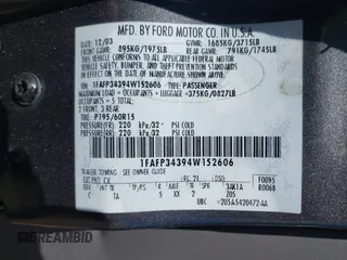 2004 Ford Focus SE with VIN 1FAFP34394W152606, listed as a IAAI auction lot 41833454 with 287,290 mi miles and . Bid and sale history available at DreamBid. Image 9.