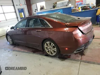2015 Lincoln MKZ z VIN 3LN6L2J96FR600052, wystawiony jako Copart lot #56194715 z przebiegiem 259 911 mil mil oraz Szkoda całkowita • Salvage title. Historia ofert i sprzedaży dostępna na DreamBid. Obrazek 2.
