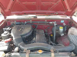 1997 Nissan Frontier XE z VIN 1N6SD11Y4VC415557, wystawiony jako IAAI lot #42399415 z przebiegiem 131 363 mil mil oraz . Historia ofert i sprzedaży dostępna na DreamBid. Obrazek 10.