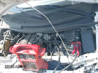 2006 Ford Freestar SE z VIN 2FMDA51666BA57711, wystawiony jako IAAI lot #39989040 z przebiegiem Nie podano mil oraz . Historia ofert i sprzedaży dostępna na DreamBid. Obrazek 10.