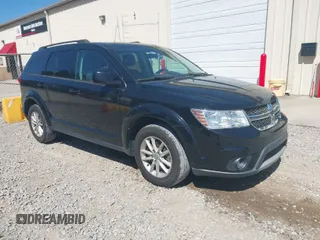 2015 Dodge Journey SXT with VIN 3C4PDCBG2FT560953, listed as a IAAI auction lot 42053264 with 127,463 mi miles and . Bid and sale history available at DreamBid. Image 1.