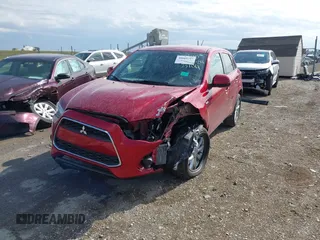 2015 Mitsubishi Outlander Sport ES with VIN 4A4AP3AU1FE053104, listed as a IAAI auction lot 40669797 with 127,778 mi miles. Bid and sale history available at carsss.com. Image 2.