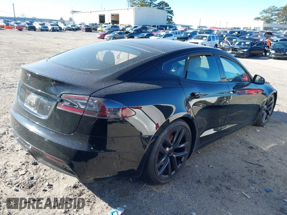 2021 Tesla Model S Long Range z VIN 5YJSA1E50MF438864, wystawiony jako IAAI lot #41190778 z przebiegiem Nie podano mil oraz . Historia ofert i sprzedaży dostępna na DreamBid. Obrazek 4.