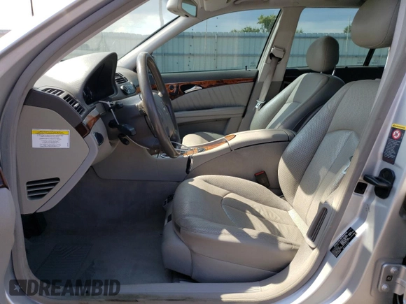 2005 Mercedes-Benz E 500 with VIN WDBUH83J85X167037, listed as a Copart auction lot 65275293 with 107,170 mi miles and Salvage Title. Bid and sale history available at carsss.com. Image 7.