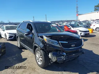 2014 Kia Sorento LX with VIN 5XYKTCA66EG483726, listed as a IAAI auction lot 41829970 with 102,294 mi miles and . Bid and sale history available at carsss.com. Image 1.