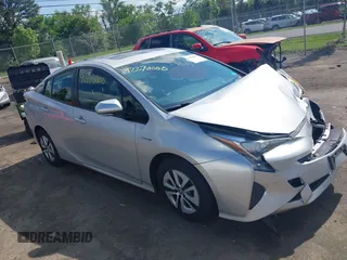2017 Toyota Prius Two with VIN JTDKARFU1H3044426, listed as a IAAI auction lot 42270000 with 125,324 mi miles and . Bid and sale history available at DreamBid. Image 1.