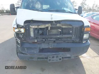 2012 Ford Econoline Cargo Commercial with VIN 1FTNE1EW4CDB18138, listed as a IAAI auction lot 41416843 with 285,734 mi miles and . Bid and sale history available at carsss.com. Image 6.