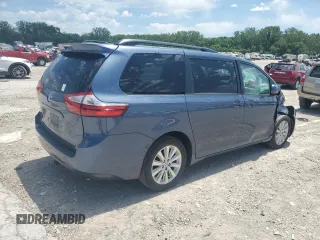 2015 Toyota Sienna LE with VIN 5TDJK3DC4FS107711, listed as a Copart auction lot 57693005 with 141,370 mi miles and Salvage title. Bid and sale history available at DreamBid. Image 3.