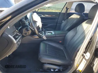 2018 BMW 7 Series 740i xDrive with VIN WBA7E4C53JGV24022, listed as a Copart auction lot 84907394 with 0 mi miles and Salvage Title. Bid and sale history available at carsss.com. Image 7.
