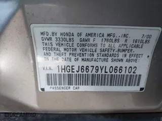 2000 Honda Civic LX with VIN 1HGEJ6679YL066102, listed as a IAAI auction lot 41585270 with 164,714 mi miles. Bid and sale history available at carsss.com. Image 9.