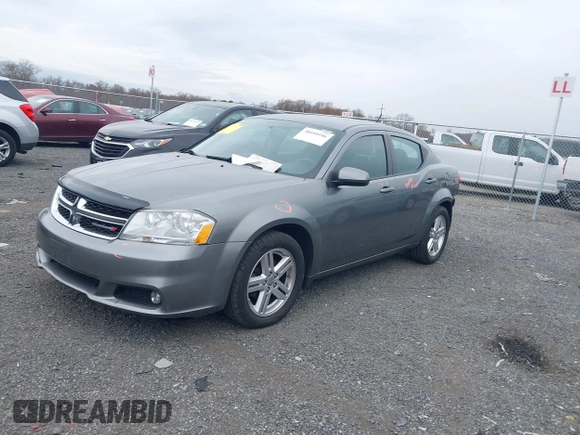 2013 Dodge Avenger SXT with VIN 1C3CDZCB6DN568480, listed as a IAAI auction lot 38104186 with 129,203 mi miles and . Bid and sale history available at DreamBid. Image 2.