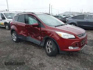 2016 Ford Escape SE with VIN 1FMCU9GX8GUB28820, listed as a IAAI auction lot 40874359 with 134,459 mi miles. Bid and sale history available at carsss.com. Image 1.