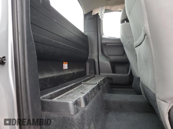 2018 Toyota Tacoma SR with VIN 5TFRX5GN1JX124112, listed as a Copart auction lot 50596975 with 57,587 mi miles and Salvage Title. Bid and sale history available at DreamBid. Image 11.