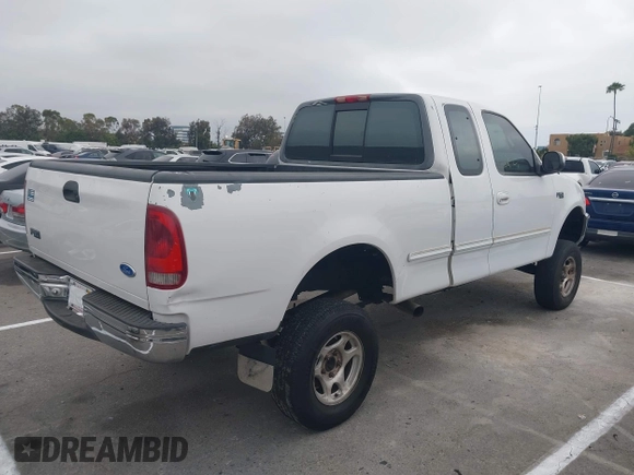 1997 Ford F-150 z VIN 1FTDX17W2VKB82664, wystawiony jako IAAI lot #42554831 z przebiegiem Nie podano mil oraz . Historia ofert i sprzedaży dostępna na DreamBid. Obrazek 4.