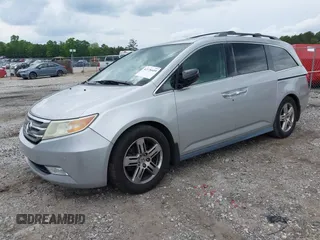 2012 Honda Odyssey Touring с VIN 5FNRL5H90CB083157, выставлен на аукционе IAAI как лот 42176609 с пробегом 250 000 миль миль и . История ставок и продаж доступна на DreamBid. Изображение 17.