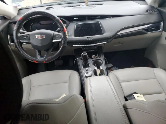 2023 Cadillac XT4 FWD Luxury with VIN 1GYAZAR45PF218684, listed as a Copart auction lot 46483515 with 74,920 mi miles and Salvage title. Bid and sale history available at DreamBid. Image 8.