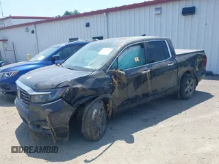 2022 Honda Ridgeline RTL-E with VIN 5FPYK3F75NB020232, listed as a IAAI auction lot 42549034 with 40,209 mi miles and . Bid and sale history available at DreamBid. Image 2.