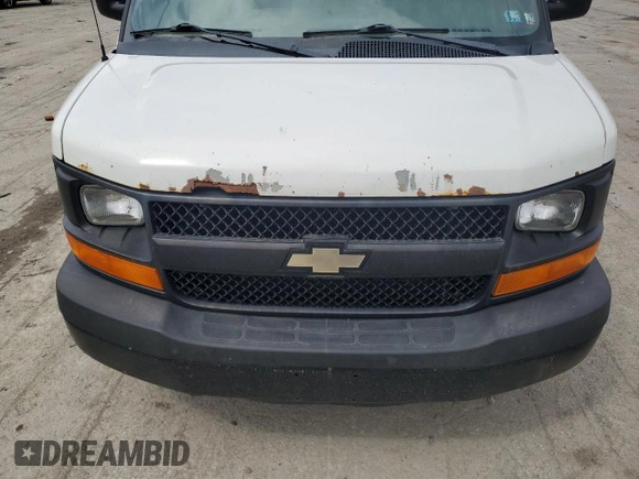 2012 Chevrolet Express Cargo z VIN 1GCSGAFX2C1141147, wystawiony jako Copart lot #54799115 z przebiegiem 286 137 mil mil oraz Czysty tytuł • Clean title. Historia ofert i sprzedaży dostępna na DreamBid. Obrazek 12.