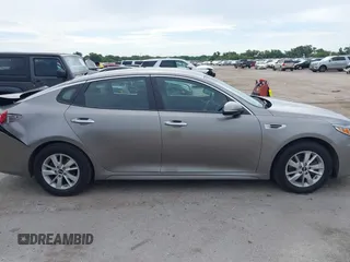 2016 Kia Optima LX with VIN 5XXGT4L37GG019897, listed as a IAAI auction lot 42582213 with 90,318 mi miles and . Bid and sale history available at DreamBid. Image 13.