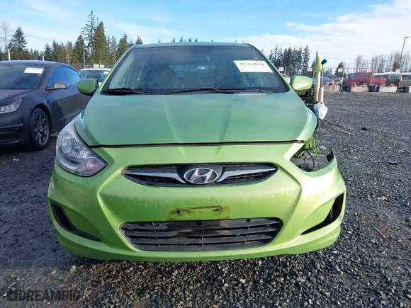 2012 Hyundai Accent GS with VIN KMHCT5AE9CU021238, listed as a IAAI auction lot 41762650 with 166,287 mi miles. Bid and sale history available at carsss.com. Image 13.