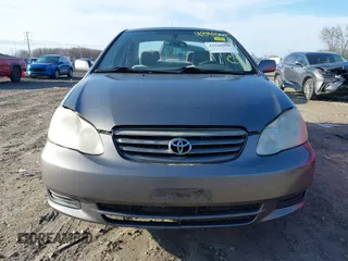 2004 Toyota Corolla CE with VIN 1NXBR38EX4Z265969, listed as a IAAI auction lot 41948986 with 235,816 mi miles. Bid and sale history available at carsss.com. Image 12.
