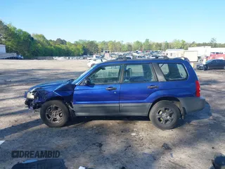 2003 Subaru Forester X with VIN JF1SG63613H743804, listed as a IAAI auction lot 42012850 with 266,100 mi miles. Bid and sale history available at carsss.com. Image 15.