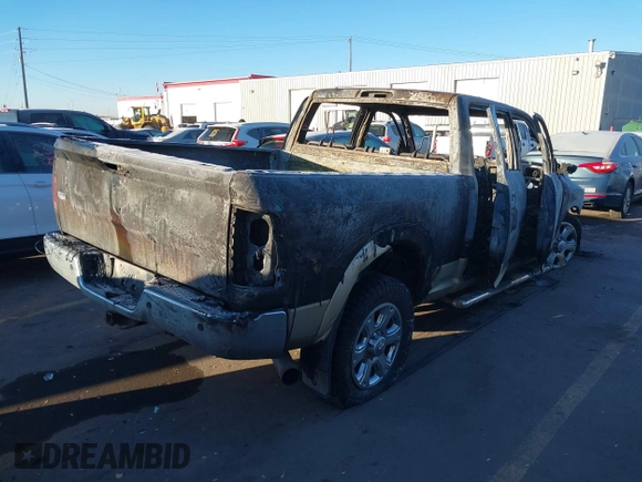 2011 Ram 2500 Big Horn z VIN 3D7UT2CL4BG513184, wystawiony jako IAAI lot #41436692 z przebiegiem Nie podano mil oraz . Historia ofert i sprzedaży dostępna na DreamBid. Obrazek 4.