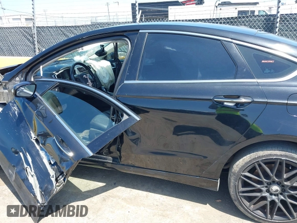 2016 Ford Fusion Titanium with VIN 3FA6P0K9XGR390364, listed as a IAAI auction lot 42165029 with 188,693 mi miles and . Bid and sale history available at DreamBid. Image 15.