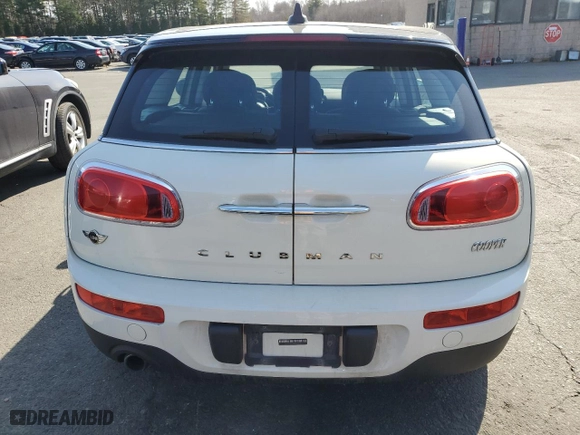 2016 MINI Cooper Clubman with VIN WMWLN5C54G2E29563, listed as a Copart auction lot 48102495 with 157,753 mi miles and Salvage Title. Bid and sale history available at carsss.com. Image 6.
