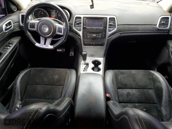 2012 Jeep Grand Cherokee SRT8 with VIN 1C4RJFDJ0CC213446, listed as a Copart auction lot 50305075 with 110,571 mi miles and Clean Title. Bid and sale history available at carsss.com. Image 8.