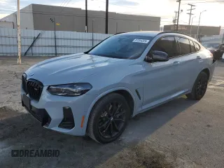 2024 BMW X4 M40i with VIN 5UX43DT03R9X53900, listed as a Copart auction lot 87204324 with 8,410 mi miles and Salvage Title. Bid and sale history available at carsss.com. Image 1.