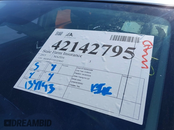 2015 Mazda 3 i SV with VIN JM1BM1T71F1218642, listed as a IAAI auction lot 42142795 with 134,143 mi miles. Bid and sale history available at carsss.com. Image 17.