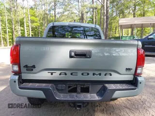 2022 Toyota Tacoma SR z VIN 3TMCZ5AN5NM518961, wystawiony jako IAAI lot #42148345 z przebiegiem 43 009 mil mil oraz . Historia ofert i sprzedaży dostępna na DreamBid. Obrazek 16.