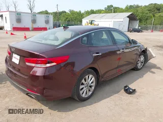 2018 Kia Optima LX z VIN 5XXGT4L30JG268095, wystawiony jako IAAI lot #42411812 z przebiegiem 119 150 mil mil oraz . Historia ofert i sprzedaży dostępna na DreamBid. Obrazek 4.