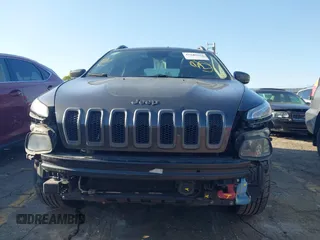 2014 Jeep Cherokee Trailhawk with VIN 1C4PJMBS6EW167517, listed as a IAAI auction lot 41947552 with 233,572 mi miles. Bid and sale history available at carsss.com. Image 6.