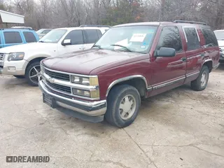 1999 Chevrolet Tahoe with VIN 1GNEC13R8XJ511786, listed as a IAAI auction lot 41538890 with 196,764 mi miles. Bid and sale history available at carsss.com. Image 2.