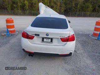 2015 BMW 4 Series 428i xDrive z VIN WBA4C9C57FD330866, wystawiony jako IAAI lot #40574326 z przebiegiem 123 726 mil mil oraz . Historia ofert i sprzedaży dostępna na DreamBid. Obrazek 16.