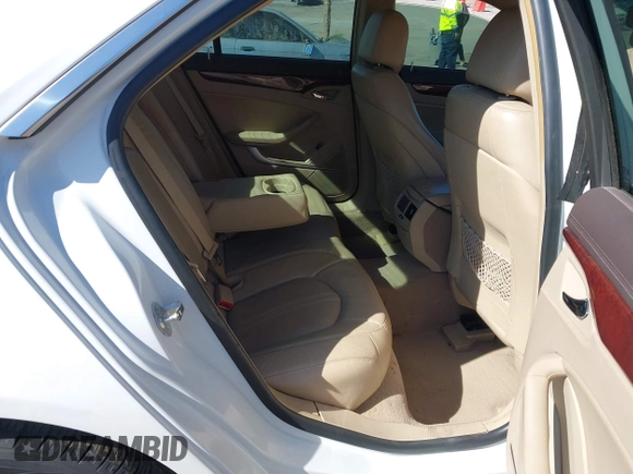 2011 Cadillac CTS Luxury with VIN 1G6DE5EY5B0119957, listed as a IAAI auction lot 41642172 with 228,401 mi miles and . Bid and sale history available at DreamBid. Image 8.