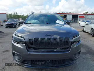 2021 Jeep Cherokee Latitude Plus z VIN 1C4PJMLB6MD117029, wystawiony jako IAAI lot #42167039 z przebiegiem 68 717 mil mil oraz . Historia ofert i sprzedaży dostępna na DreamBid. Obrazek 12.