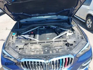 2021 BMW X5 sDrive40i with VIN 5UXCR4C03M9F14479, listed as a IAAI auction lot 41884878 with 1 mi miles. Bid and sale history available at carsss.com. Image 10.