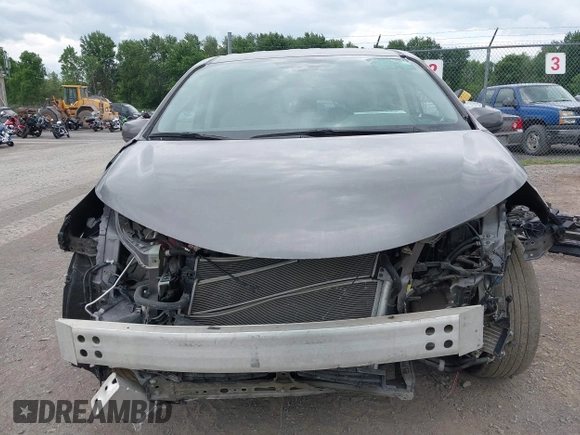 2021 Toyota Sienna LE with VIN 5TDKRKEC9MS034194, listed as a IAAI auction lot 42552990 with 21,633 mi miles and . Bid and sale history available at DreamBid. Image 6.