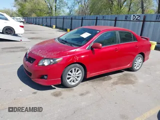 2009 Toyota Corolla with VIN 1NXBU40E09Z098951, listed as a IAAI auction lot 42090512 with 199,787 mi miles. Bid and sale history available at carsss.com. Image 2.