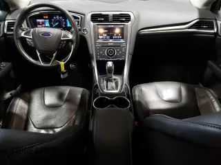 2014 Ford Fusion Titanium с VIN 3FA6P0K98ER304398, выставлен на аукционе Copart как лот 61048165 с пробегом 160 077 миль миль и Чистый • Clean title. История ставок и продаж доступна на DreamBid. Изображение 8.